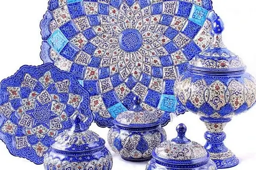 Persian MinaKari plates and four enamel bowls in varied sizes