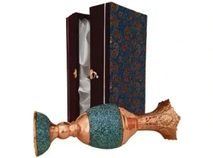 Handmade turquoise inlay Sonboldan lying next to closed box