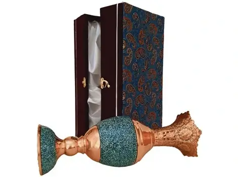 Handmade turquoise inlay Sonboldan lying next to closed box