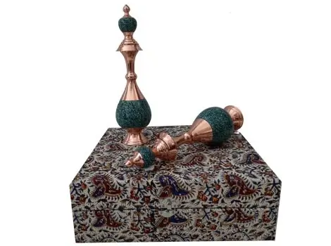 One Sorahi decanter standing and one lying on the gift box