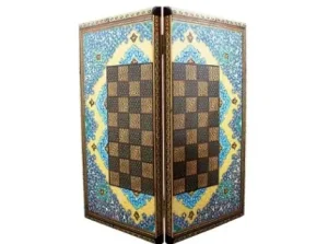 Angled view of Persian chess board with detailed Tazhib illumination