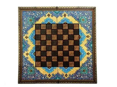 Top-down view of Persian Khatam chess board with Tazhib artwork