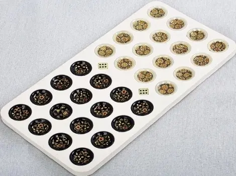 Set of 32 wooden Persian backgammon pieces