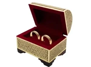 Open Persian Khatam ring box with velvet interior and symbolic rings inside