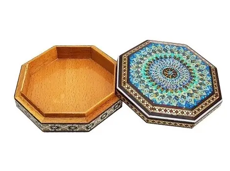 Open Persian bracelet box with velvet interior and lid next to it