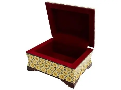 Open Persian jewelry box with velvet-lined interior