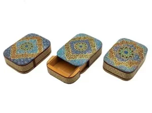Three Persian card deck boxes with one open in the middle
