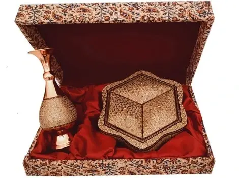 Khatam copper vase and three-lid wooden candy dish on display