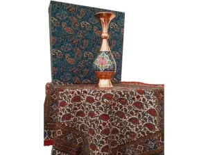 Mes Pardaz copper vase standing on spread Ghalamkar tablecloth with gift box in background